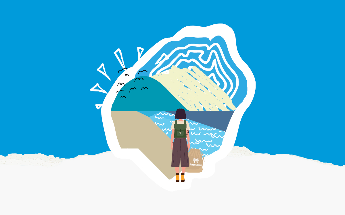 Woman walking on a beach with a clean up bag
