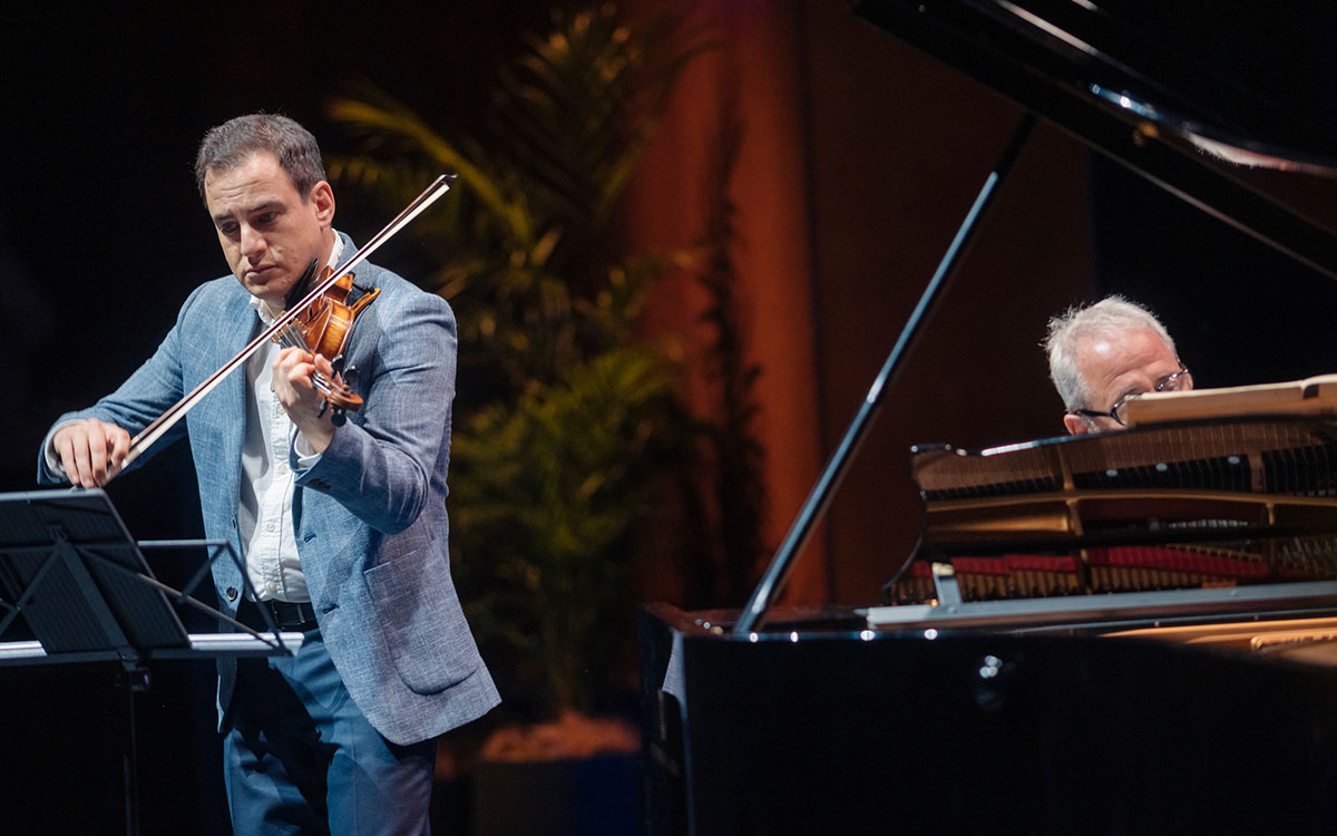 Violinist and Pianist playing music