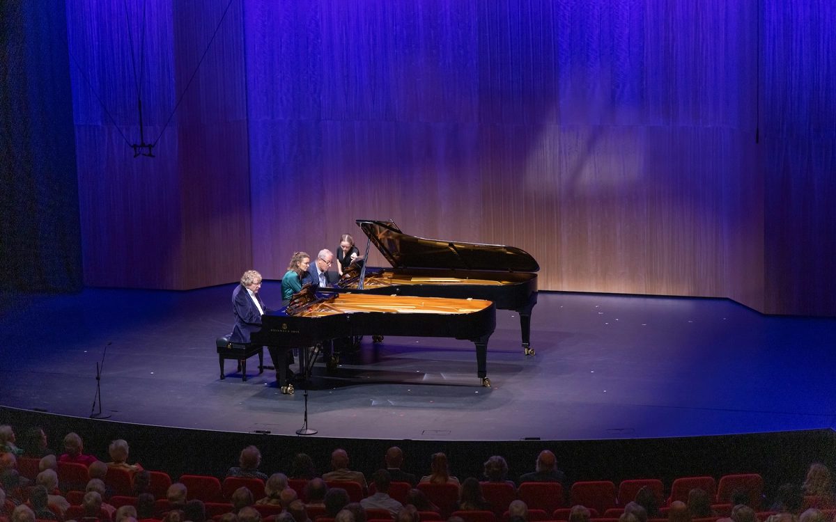 Musicians playing at an evening concert