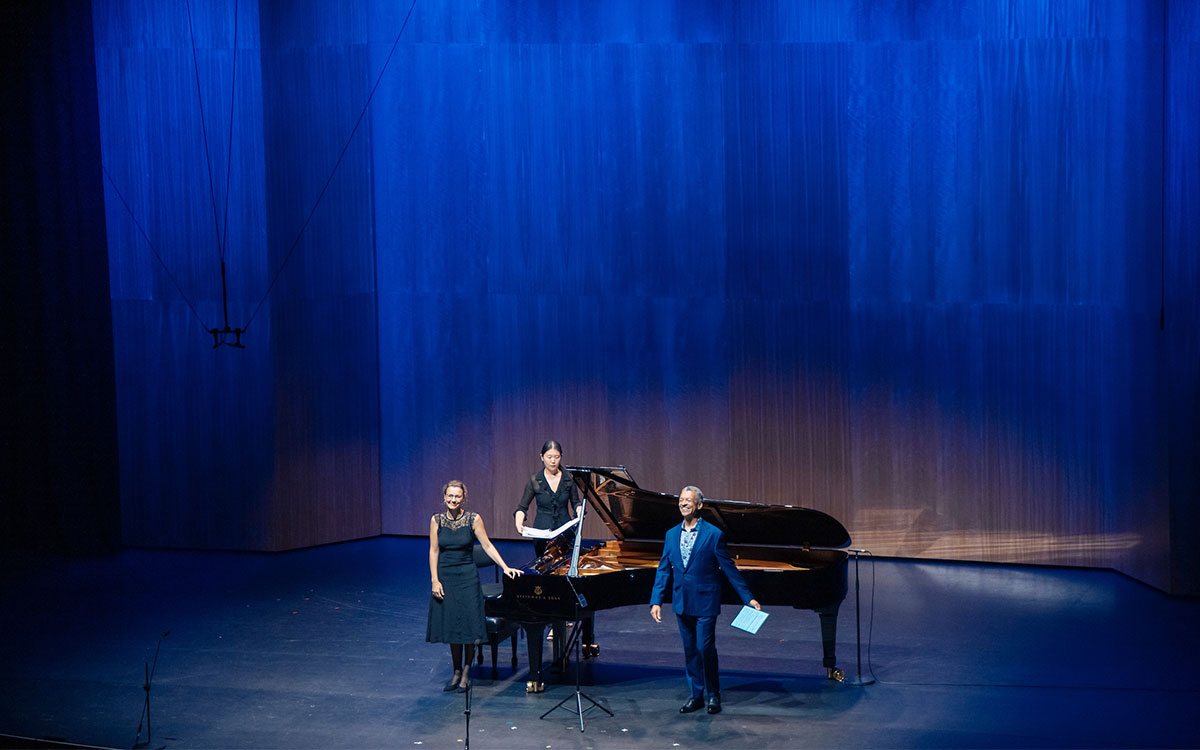 Pianists being applauded