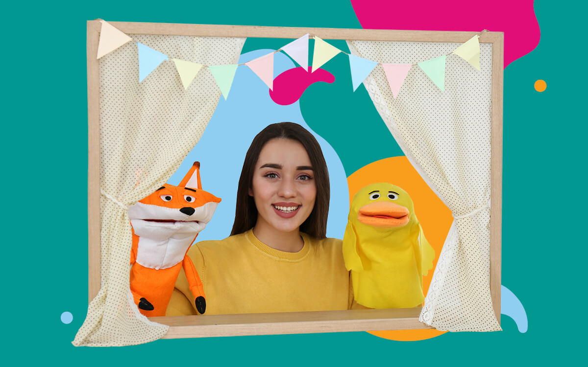 Ros with fox and duck puppets on each hand