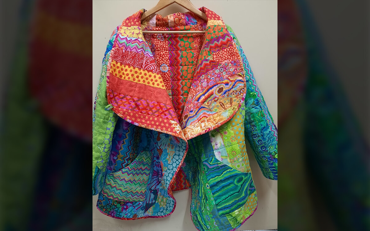 Colourful dress on a hanger