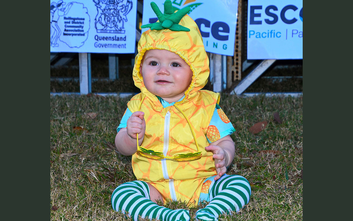 Baby in a pineapple costume