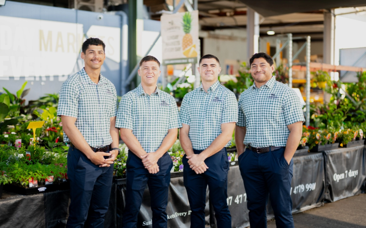 Lamberts boys in front of plants