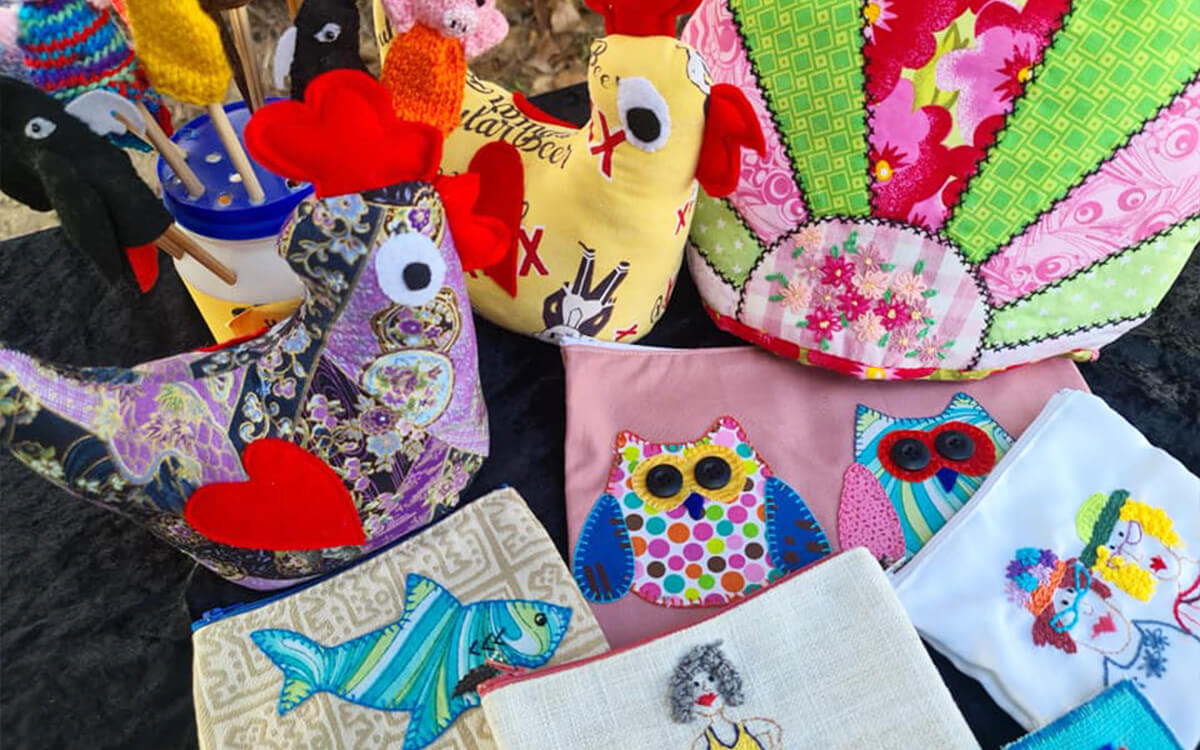 A selection of cloth craft including chickens
