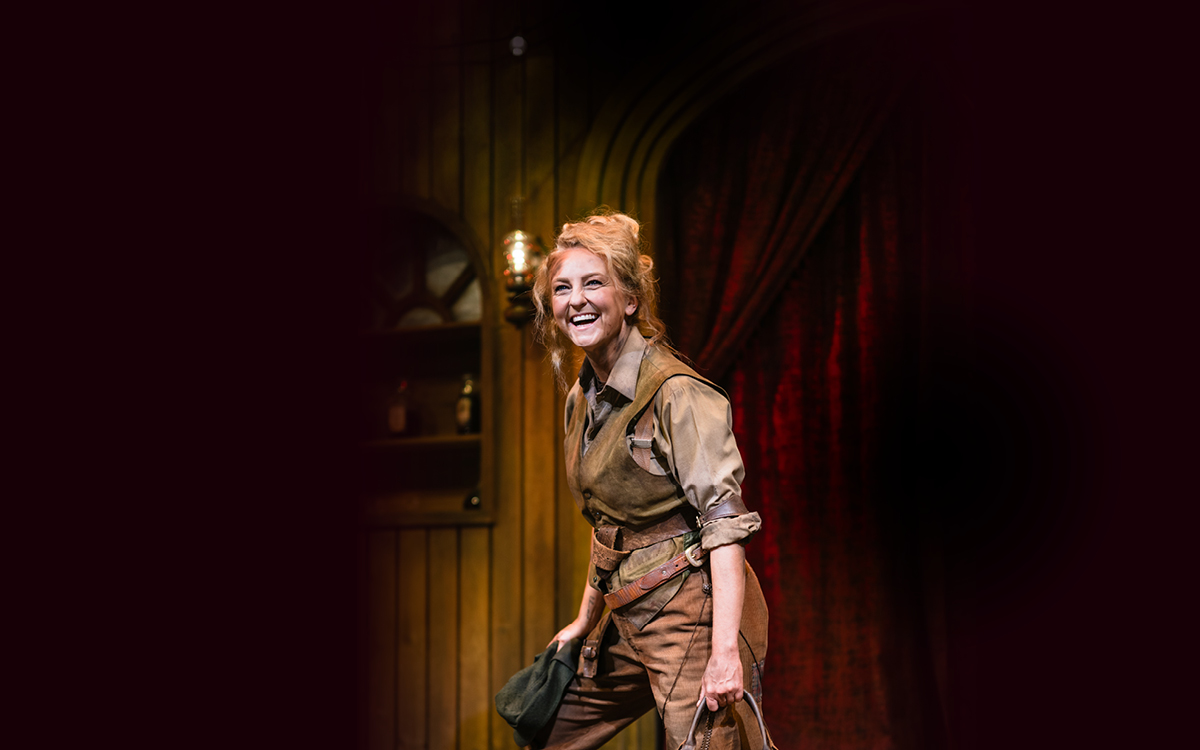 Calamity Jane smiling onstage