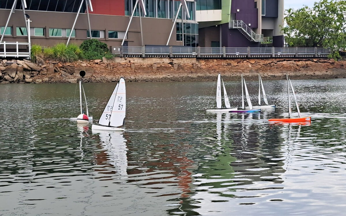 Radio-controlled yachts racing around a buoy