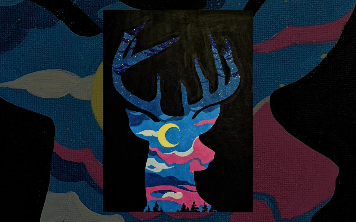 A deer painted in pink and blue