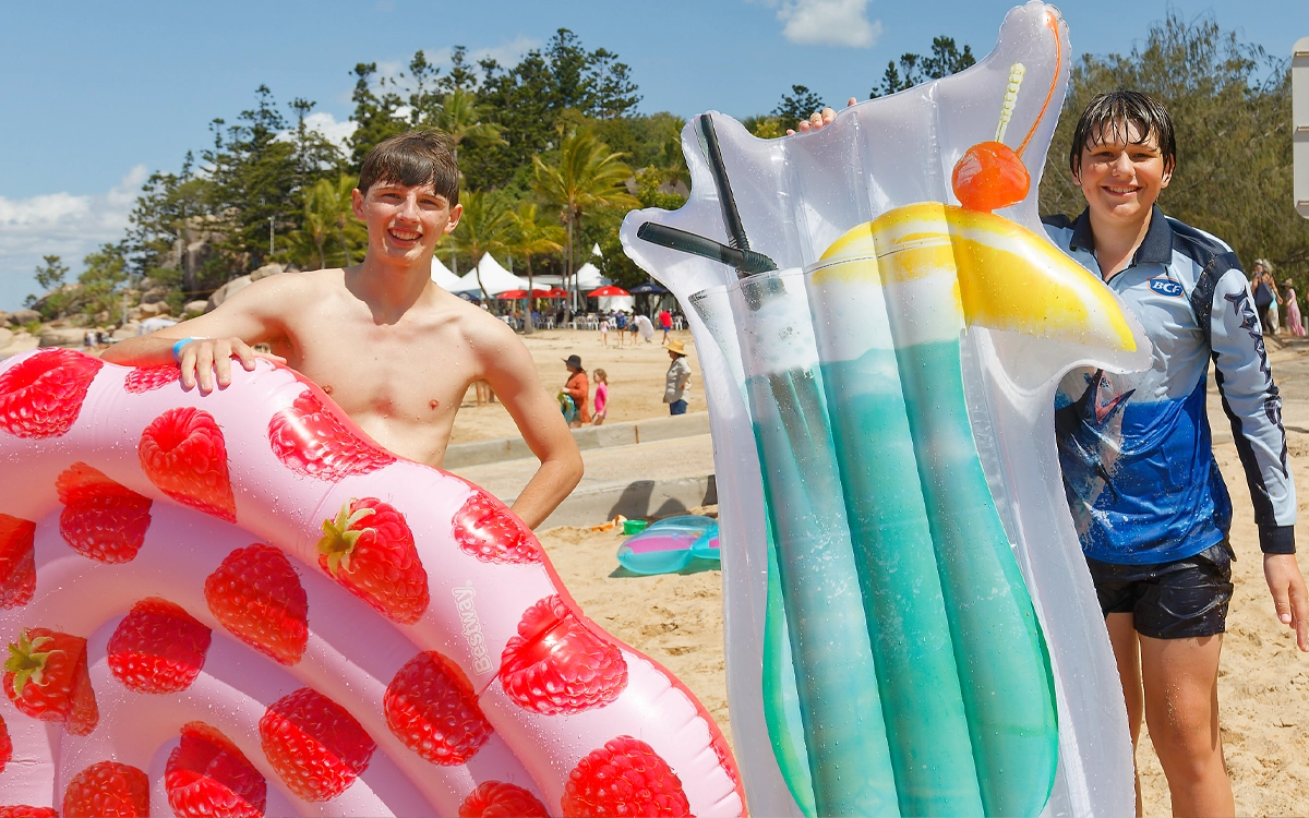 Kids participating in the inflatable race
