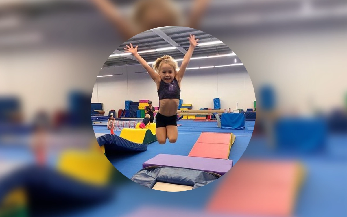 A participant in freeplay gymnastics