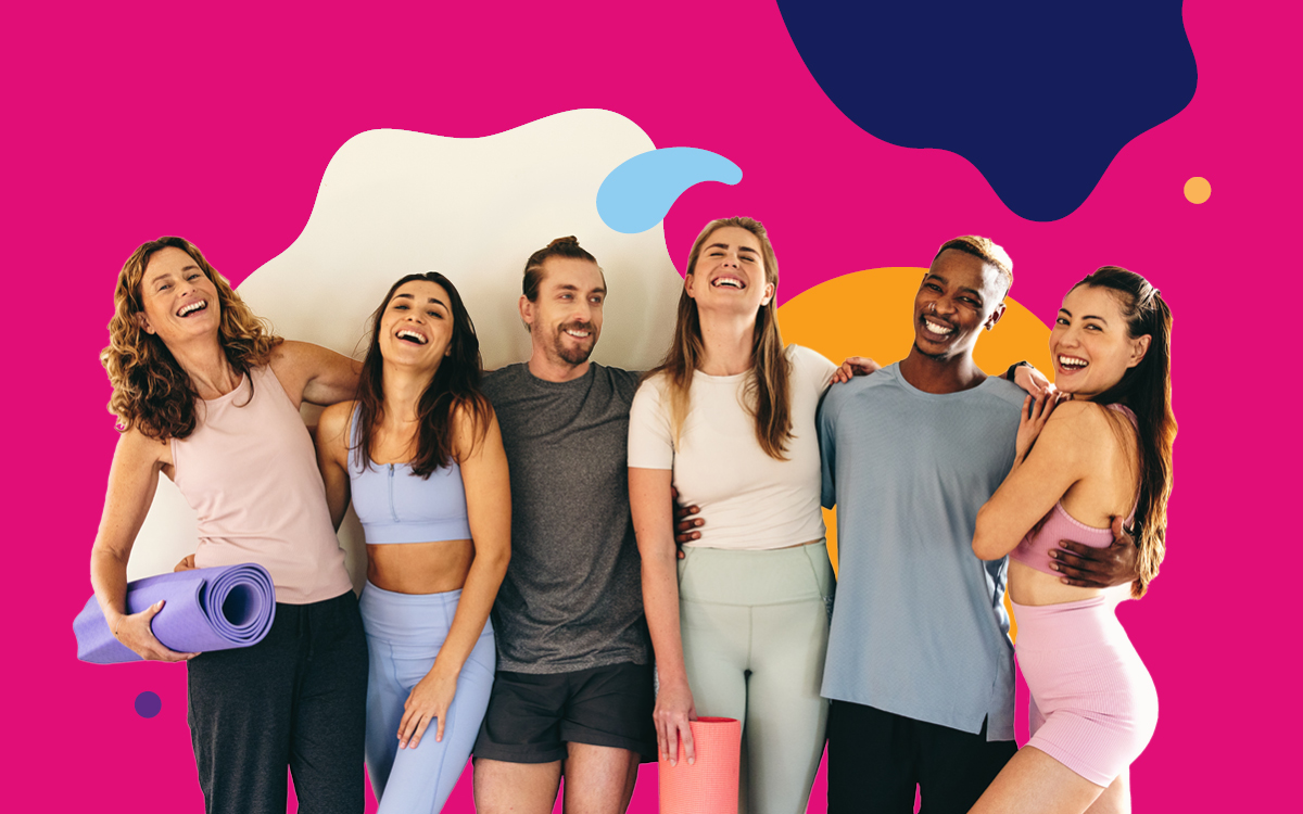 Happy mixed group of people standing in line for yoga