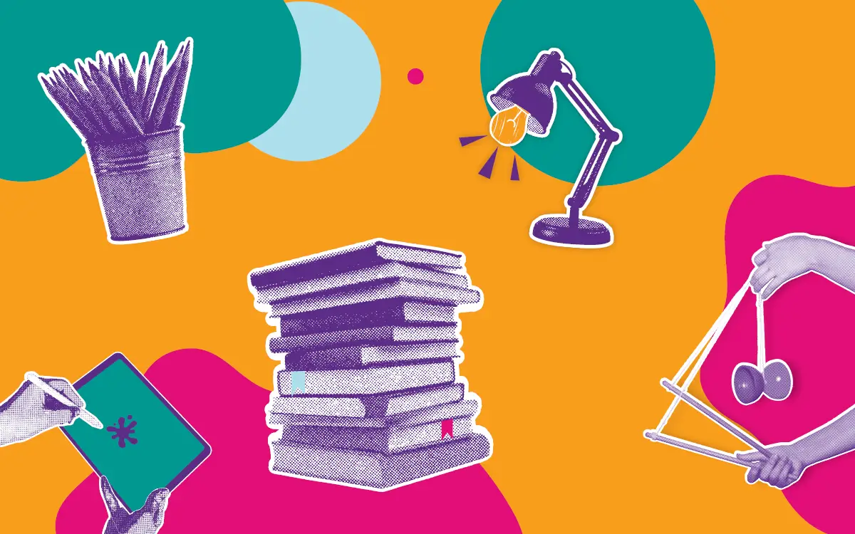 Books, lamp, pencils and drawing tablet