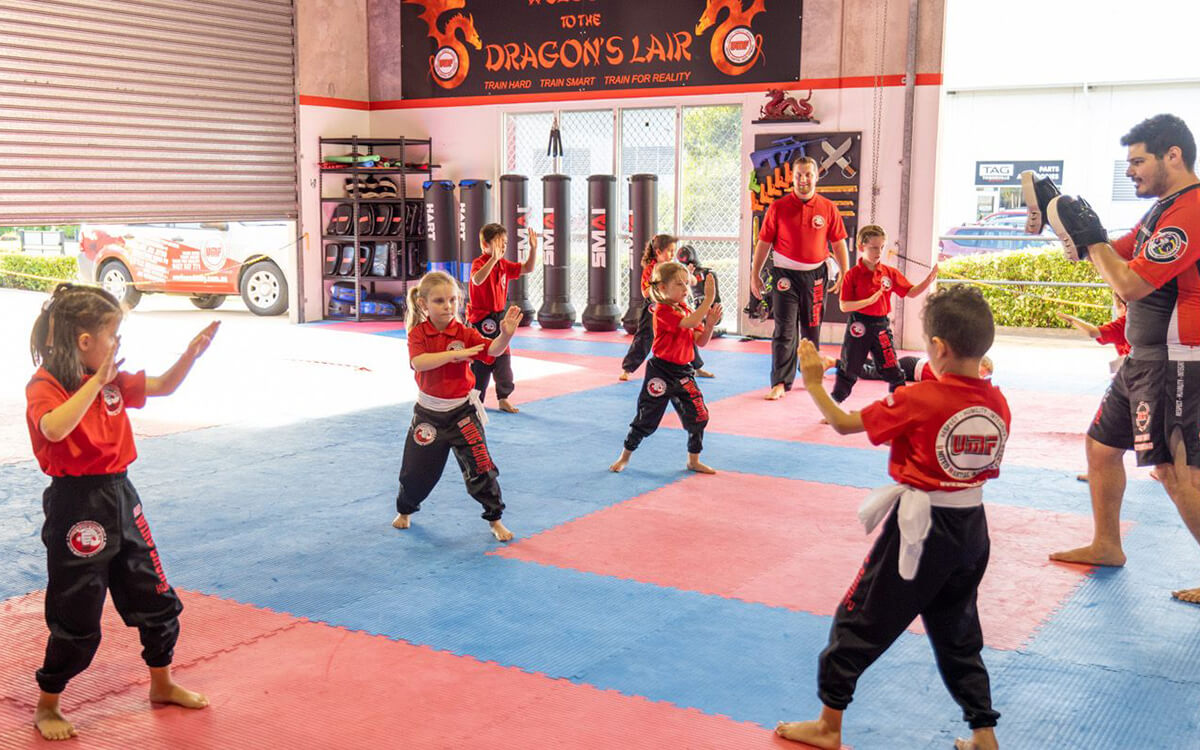 Children practising self-defence
