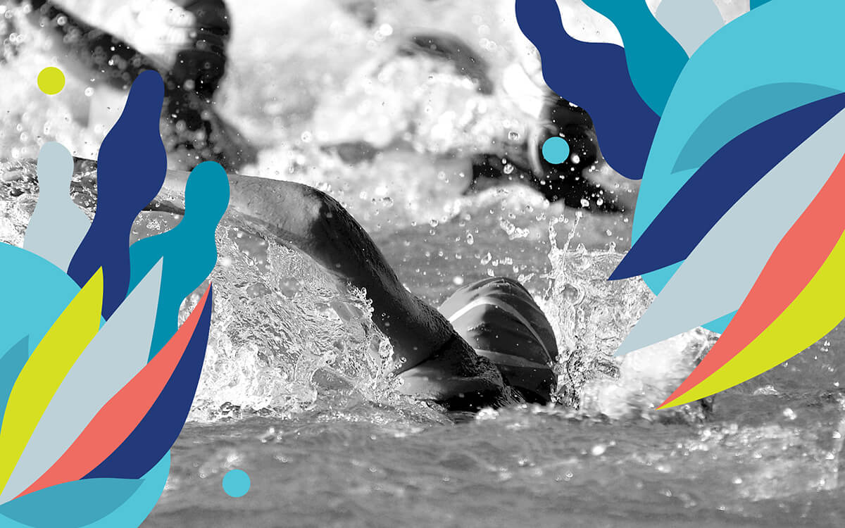 A swimmer surrounded by vibrant coloured shapes.