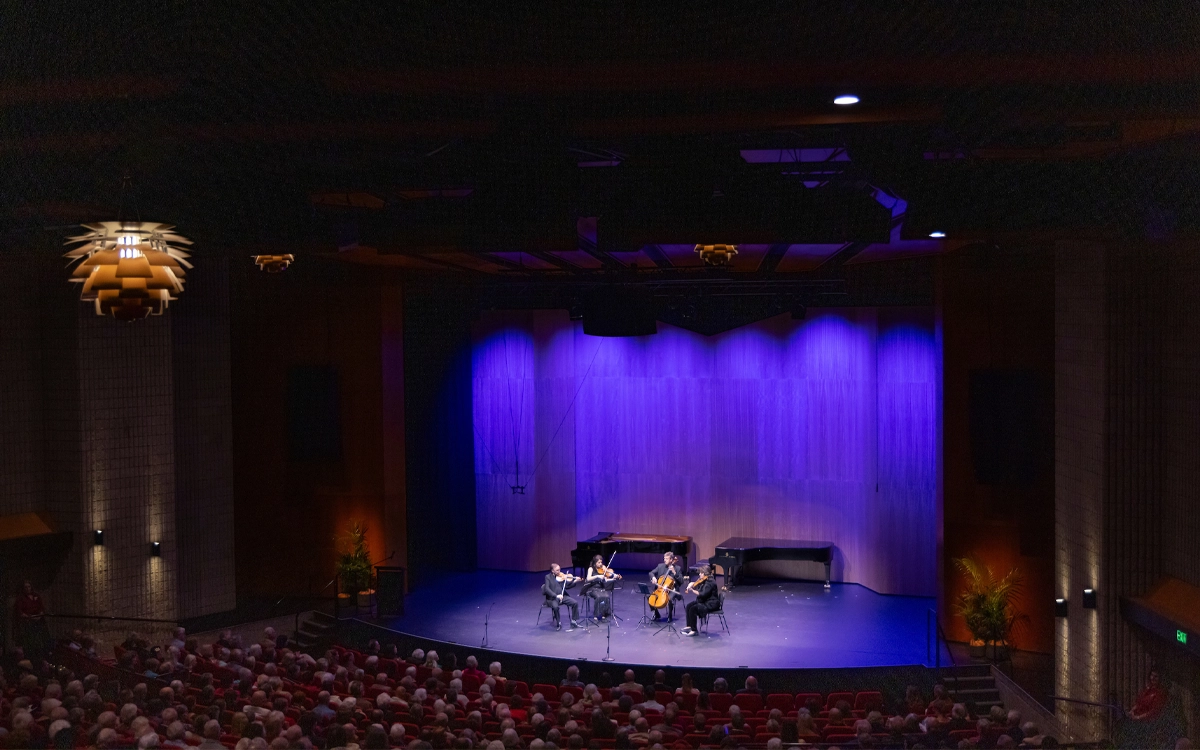Musicians playing at an evening concert