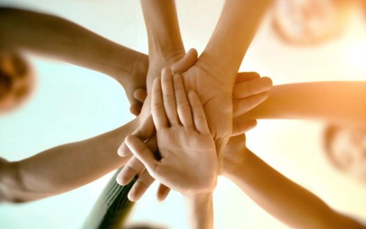 People holding hands together