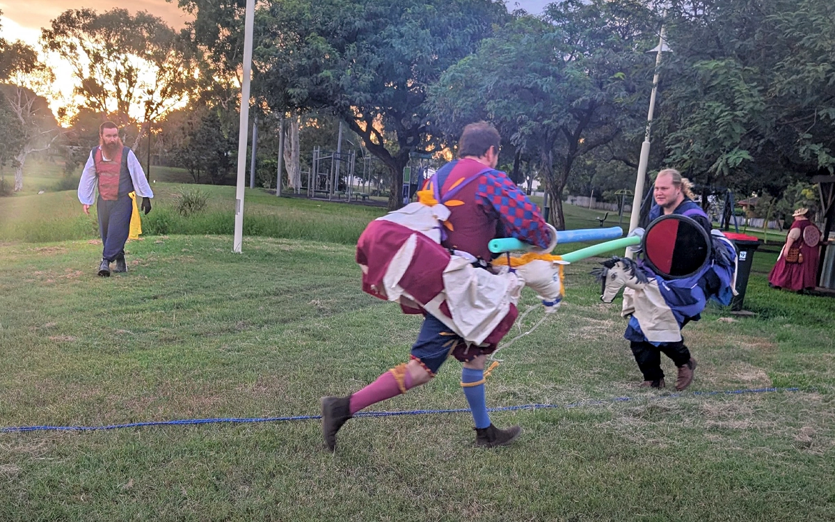 Swordcraft participants in battle